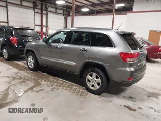 2011 Jeep Grand Cherokee Laredo with VIN 1J4RR4GG3BC623048, listed as a IAAI auction lot 42163452 with 192,241 mi miles and . Bid and sale history available at DreamBid. Image 3.