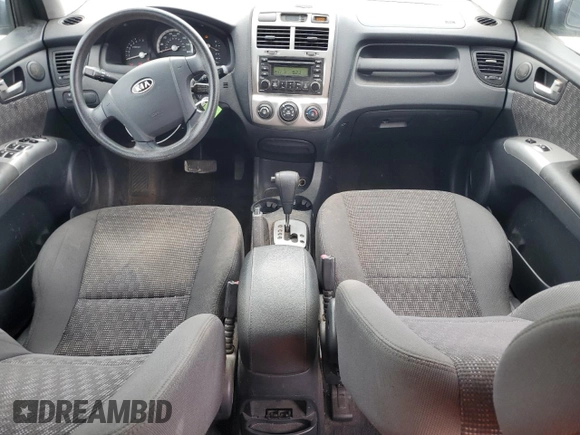 2005 Kia Sportage LX with VIN KNDJF723557078730, listed as a Copart auction lot 79823504 with 166,509 mi miles and Salvage Title. Bid and sale history available at carsss.com. Image 8.