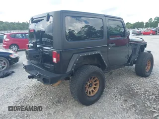 2012 Jeep Wrangler Sport z VIN 1C4AJWAG2CL286680, wystawiony jako IAAI lot #42434411 z przebiegiem 97 142 mil mil oraz . Historia ofert i sprzedaży dostępna na DreamBid. Obrazek 4.