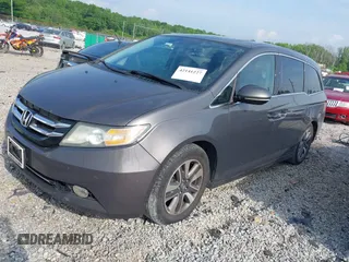 2014 Honda Odyssey Touring with VIN 5FNRL5H99EB111685, listed as a IAAI auction lot 42141227 with 183,484 mi miles and . Bid and sale history available at DreamBid. Image 17.