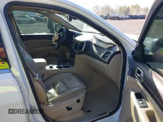 2015 Jeep Grand Cherokee Overland with VIN 1C4RJFCT6FC653386, listed as a IAAI auction lot 42084723 with 101,993 mi miles. Bid and sale history available at carsss.com. Image 5.