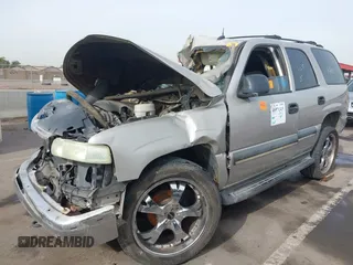 2004 Chevrolet Tahoe LT z VIN 1GNEC13ZX4R131734, wystawiony jako IAAI lot #40971315 z przebiegiem Nie podano mil oraz . Historia ofert i sprzedaży dostępna na DreamBid. Obrazek 2.