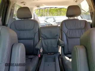 2005 Honda Odyssey EX-L z VIN 5FNRL386X5B034514, wystawiony jako Copart lot #52702435 z przebiegiem 65 988 mil mil oraz Szkoda całkowita • Salvage title. Historia ofert i sprzedaży dostępna na DreamBid. Obrazek 10.