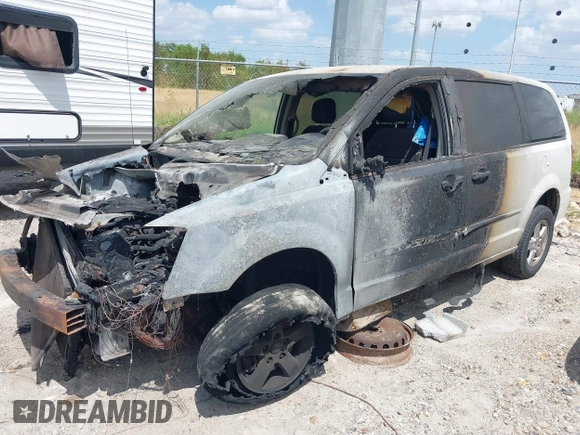 2013 Dodge Grand Caravan SXT with VIN 2C4RDGCG5DR524074, listed as a IAAI auction lot 37312051 with Not Provided miles and . Bid and sale history available at DreamBid. Image 2.