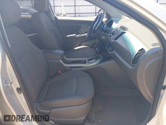 2013 Kia Sportage LX with VIN KNDPBCA24D7352828, listed as a IAAI auction lot 42685744 with 156,805 mi miles and . Bid and sale history available at DreamBid. Image 5.
