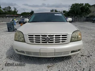 2003 Cadillac DeVille DTS z VIN 1G6KF57973U204531, wystawiony jako Copart lot #45712115 z przebiegiem 107 737 mil mil oraz Szkoda całkowita • Salvage title. Historia ofert i sprzedaży dostępna na DreamBid. Obrazek 5.
