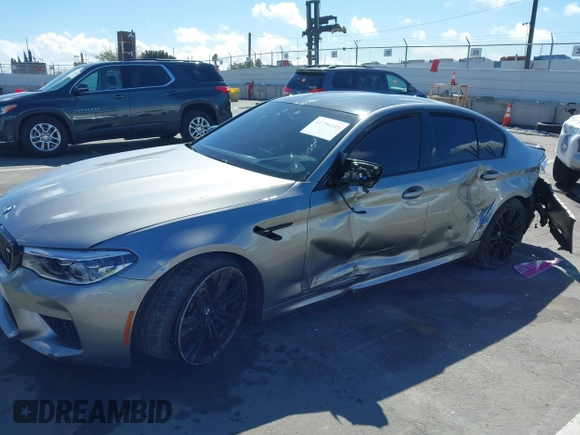 2020 BMW M5 Competition z VIN WBSJF0C05LB448878, wystawiony jako IAAI lot #41796245 z przebiegiem 62 856 mil mil oraz . Historia ofert i sprzedaży dostępna na DreamBid. Obrazek 6.