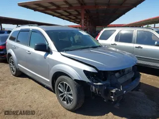 2018 Dodge Journey SE with VIN 3C4PDCAB6JT508420, listed as a IAAI auction lot 41591748 with 149,649 mi miles. Bid and sale history available at carsss.com. Image 1.