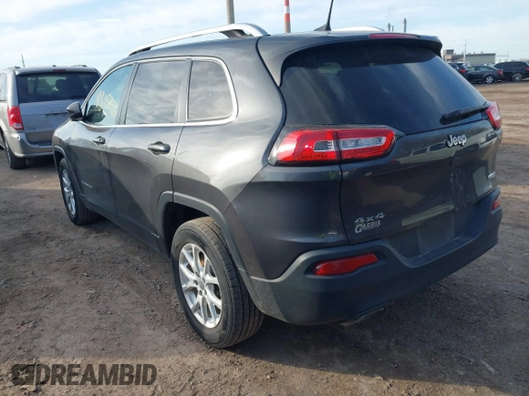 2016 Jeep Cherokee Latitude with VIN 1C4PJMCS7GW246423, listed as a IAAI auction lot 41805421 with 60,880 mi miles and . Bid and sale history available at carsss.com. Image 3.