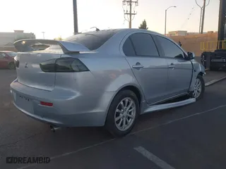 2012 Mitsubishi Lancer ES with VIN JA32U2FU1CU027013, listed as a IAAI auction lot 41739820 with 124,549 mi miles. Bid and sale history available at carsss.com. Image 4.