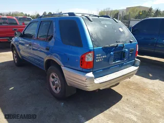 2001 Isuzu Rodeo S with VIN 4S2CK58W014315005, listed as a IAAI auction lot 41880618 with 147,384 mi miles. Bid and sale history available at carsss.com. Image 3.