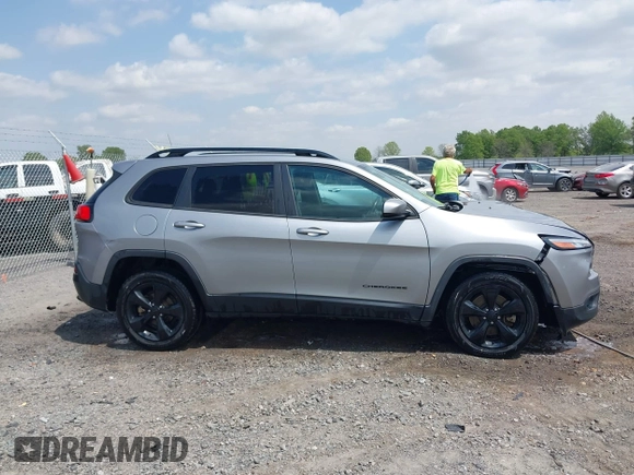 2016 Jeep Cherokee Latitude with VIN 1C4PJLCB3GW176901, listed as a IAAI auction lot 42019983 with 141,104 mi miles and . Bid and sale history available at DreamBid. Image 13.