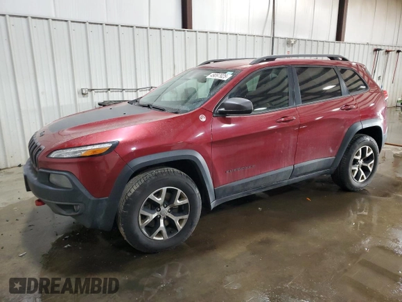 2015 Jeep Cherokee Trailhawk with VIN 1C4PJMBB8FW576765, listed as a Copart auction lot 49097925 with 299,877 mi miles and Clean Title. Bid and sale history available at DreamBid. Image 1.