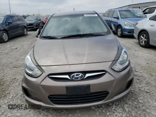 2012 Hyundai Accent GS z VIN KMHCT5AE0CU015960, wystawiony jako Copart lot #52250035 z przebiegiem 93 818 mil mil oraz Szkoda całkowita • Salvage title. Historia ofert i sprzedaży dostępna na DreamBid. Obrazek 5.