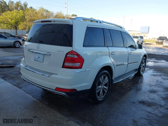 2011 Mercedes-Benz GL-Class GL 450 with VIN 4JGBF7BE1BA641658, listed as a IAAI auction lot 41756641 with 148,474 mi miles. Bid and sale history available at carsss.com. Image 4.