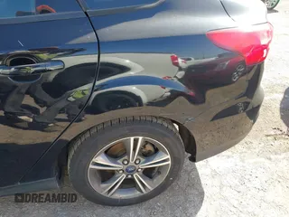 2016 Ford Focus SE with VIN 1FADP3FE7GL202284, listed as a IAAI auction lot 42014457 with 130,000 mi miles. Bid and sale history available at carsss.com. Image 6.