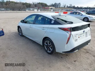 2016 Toyota Prius Four with VIN JTDKARFU3G3021048, listed as a IAAI auction lot 41633306 with 120,632 mi miles. Bid and sale history available at carsss.com. Image 3.