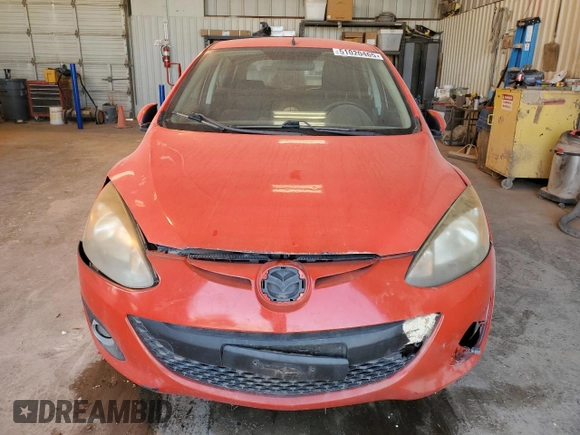 2013 Mazda 2 Touring z VIN JM1DE1LYXD0161293, wystawiony jako Copart lot #51020465 z przebiegiem 72 770 mil mil oraz Czysty tytuł • Clean title. Historia ofert i sprzedaży dostępna na DreamBid. Obrazek 5.