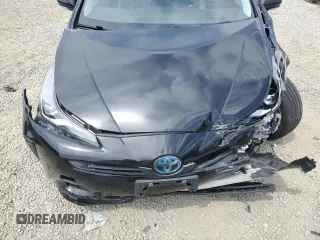 2020 Toyota Prius L Eco z VIN JTDKARFU1L3113480, wystawiony jako Copart lot #52830035 z przebiegiem Nie podano mil oraz Szkoda całkowita • Salvage title. Historia ofert i sprzedaży dostępna na DreamBid. Obrazek 11.