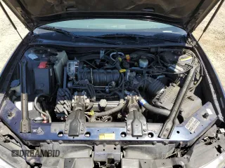 2000 Pontiac Grand Prix GT z VIN 1G2WP12K7YF189639, wystawiony jako Copart lot #57891595 z przebiegiem 70 055 mil mil oraz Tytuł czysty. Historia ofert i sprzedaży dostępna na DreamBid. Obrazek 11.