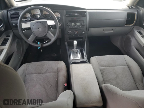 2007 Dodge Charger with VIN 2B3KA43R27H672429, listed as a Copart auction lot 45078155 with 165,145 mi miles and Salvage Title. Bid and sale history available at DreamBid. Image 8.