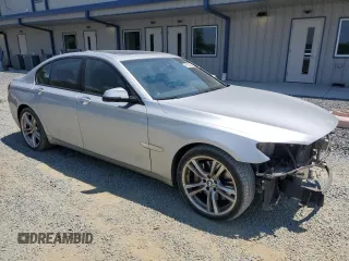 2013 BMW 7 Series 750i with VIN WBAYA8C58DC996865, listed as a Copart auction lot 61831294 with 151,238 mi miles and Salvage Title. Bid and sale history available at DreamBid. Image 4.