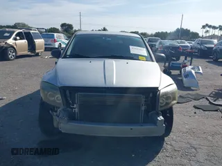 2009 Dodge Caliber SXT with VIN 1B3HB48A39D142674, listed as a IAAI auction lot 41642867 with 156,504 mi miles and . Bid and sale history available at carsss.com. Image 6.