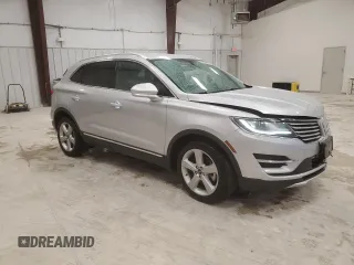 2018 Lincoln MKC Premiere with VIN 5LMCJ1C90JUL07472, listed as a Copart auction lot 50595015 with 74,989 mi miles and Salvage Title. Bid and sale history available at DreamBid. Image 4.