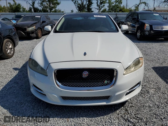 2015 Jaguar XJ with VIN SAJWA1CZ8F8V81637, listed as a Copart auction lot 55619555 with 88,328 mi miles and Salvage Title. Bid and sale history available at DreamBid. Image 5.