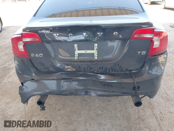 2013 Volvo S60 T5 Premier z VIN YV1612FS4D2217471, wystawiony jako IAAI lot #41986419 z przebiegiem 96 910 mil mil oraz . Historia ofert i sprzedaży dostępna na DreamBid. Obrazek 6.