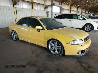2000 Audi S4 z VIN WAUDD68D1YA107657, wystawiony jako Copart lot #81312104 z przebiegiem 133 371 mil mil oraz Tytuł czysty. Historia ofert i sprzedaży dostępna na DreamBid. Obrazek 4.
