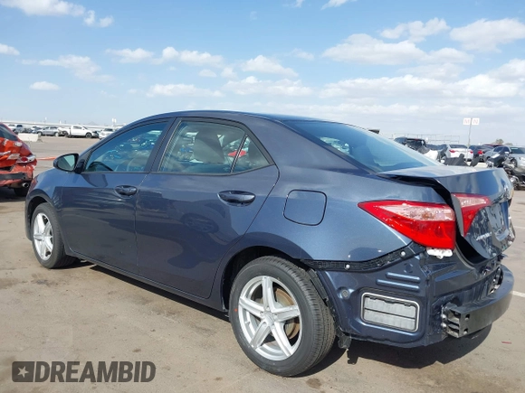 2018 Toyota Corolla L with VIN 5YFBURHEXJP806632, listed as a IAAI auction lot 41933984 with 70,091 mi miles and . Bid and sale history available at DreamBid. Image 3.