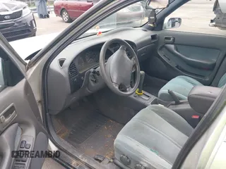 1993 Toyota Camry LE z VIN 4T1SK12E0PU290398, wystawiony jako IAAI lot #42032664 z przebiegiem 264 922 mil mil oraz . Historia ofert i sprzedaży dostępna na DreamBid. Obrazek 5.