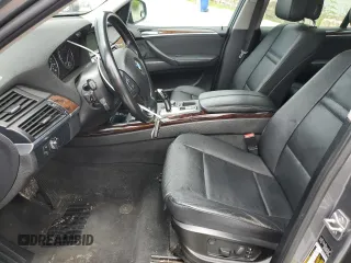 2012 BMW X5 35i with VIN 5UXZV4C50CL991452, listed as a Copart auction lot 56890265 with 147,019 mi miles and Salvage title. Bid and sale history available at DreamBid. Image 7.