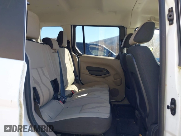 2014 Ford Transit Connect XLT z VIN NM0AE8F7XE1148356, wystawiony jako IAAI lot #41658732 z przebiegiem 128 180 mil mil oraz . Historia ofert i sprzedaży dostępna na DreamBid. Obrazek 8.