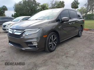 2020 Honda Odyssey Elite with VIN 5FNRL6H91LB030294, listed as a IAAI auction lot 41608291 with 74,477 mi miles and . Bid and sale history available at DreamBid. Image 17.