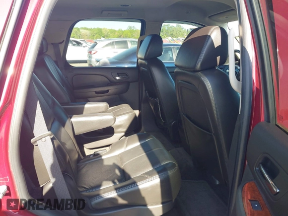 2007 Chevrolet Tahoe LTZ z VIN 1GNFK13077J294577, wystawiony jako IAAI lot #42144278 z przebiegiem 168 054 mil mil oraz . Historia ofert i sprzedaży dostępna na DreamBid. Obrazek 8.