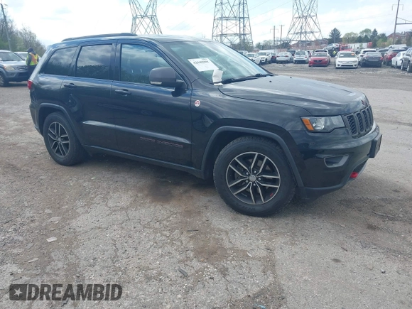 2017 Jeep Grand Cherokee Trailhawk with VIN 1C4RJFLG3HC674489, listed as a IAAI auction lot 42049006 with 91,892 mi miles and . Bid and sale history available at DreamBid. Image 1.