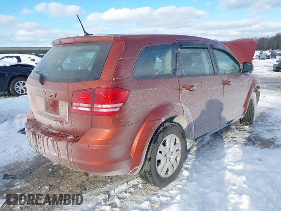 2014 Dodge Journey SE with VIN 3C4PDCAB0ET164105, listed as a IAAI auction lot 41592204 with 133,883 mi miles and . Bid and sale history available at carsss.com. Image 4.