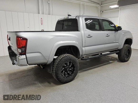 2020 Toyota Tacoma SR5 z VIN 5TFAZ5CN9LX089772, wystawiony jako Copart lot #60783225 z przebiegiem 59 592 mil mil oraz Czysty tytuł • Clean title. Historia ofert i sprzedaży dostępna na DreamBid. Obrazek 3.