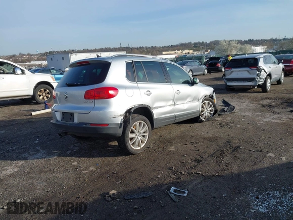 2013 Volkswagen Tiguan S with VIN WVGAV3AX0DW572915, listed as a IAAI auction lot 41937763 with 65,136 mi miles and . Bid and sale history available at DreamBid. Image 4.