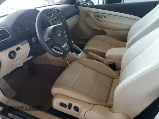 2015 Volkswagen Eos Komfort с VIN WVWBW8AH9FV001976, выставлен на аукционе Copart как лот 59529925 с пробегом 54 520 миль миль и Списание • Salvage title. История ставок и продаж доступна на DreamBid. Изображение 7.