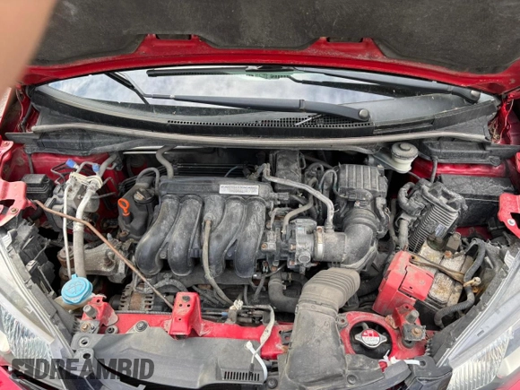 2015 Honda Fit LX with VIN 3HGGK5H50FM760104, listed as a Copart auction lot 63164915 with 118,328 mi miles and Clean title. Bid and sale history available at DreamBid. Image 7.