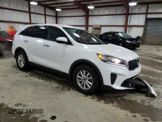 2019 Kia Sorento LX z VIN 5XYPG4A56KG558427, wystawiony jako Copart lot #51971055 z przebiegiem 103 523 mil mil oraz Szkoda całkowita • Salvage title. Historia ofert i sprzedaży dostępna na DreamBid. Obrazek 4.