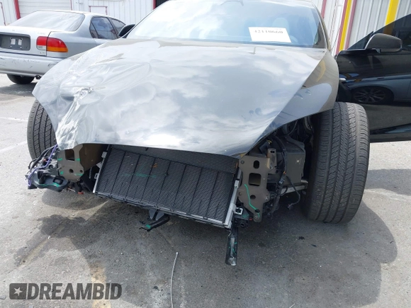 2023 Tesla Model S with VIN 5YJSA1E52PF528795, listed as a IAAI auction lot 42110660 with 21,243 mi miles and . Bid and sale history available at DreamBid. Image 6.