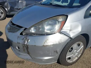 2013 Honda Fit with VIN JHMGE8H39DC055353, listed as a IAAI auction lot 41986501 with 159,569 mi miles. Bid and sale history available at carsss.com. Image 6.