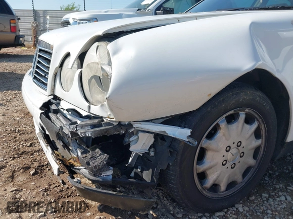 1999 Mercedes-Benz E-Class with VIN WDBJF65H6XA867166, listed as a IAAI auction lot 42017341 with 89,841 mi miles. Bid and sale history available at carsss.com. Image 6.