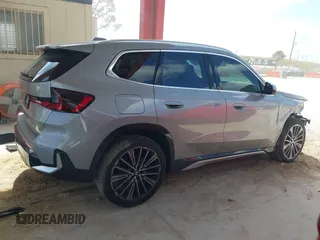 2023 BMW X1 xDrive28i z VIN WBX73EF09P5W51069, wystawiony jako IAAI lot #42145061 z przebiegiem 24 960 mil mil oraz . Historia ofert i sprzedaży dostępna na DreamBid. Obrazek 14.