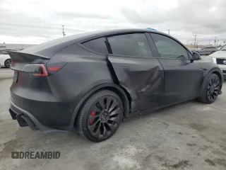 2022 Tesla Model Y Performance with VIN 7SAYGDEF7NF318647, listed as a Copart auction lot 53822465 with 38,724 mi miles and Salvage title. Bid and sale history available at DreamBid. Image 3.