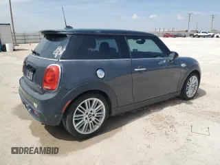 2014 MINI Hardtop S with VIN WMWXM7C50ET985583, listed as a Copart auction lot 50820675 with 75,759 mi miles and Clean Title. Bid and sale history available at DreamBid. Image 3.